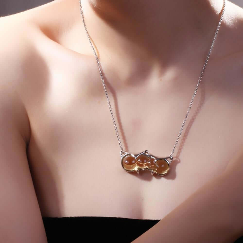 LIULI Crystal Art Crystal and Sterling Silver "Eyes Only for You" Owl Necklace in Light Amber